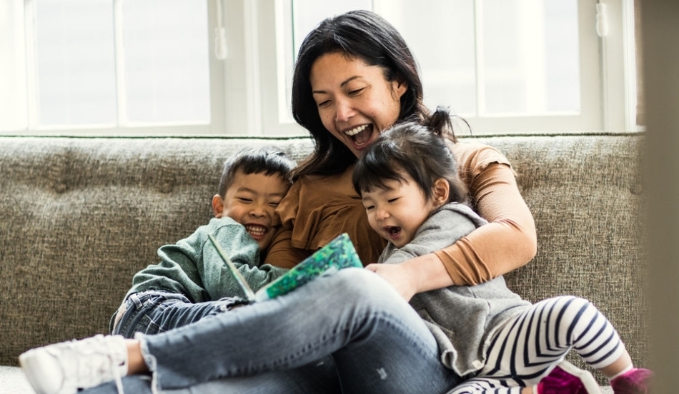 Mother and children laughing